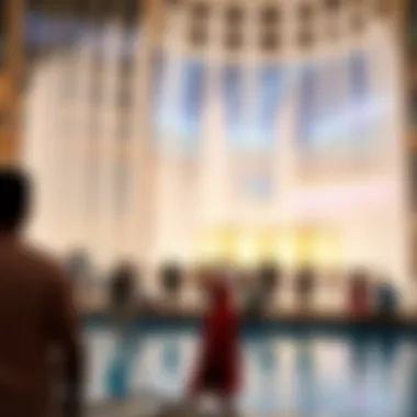 Visitors enjoying the fountain show against the backdrop of the mall