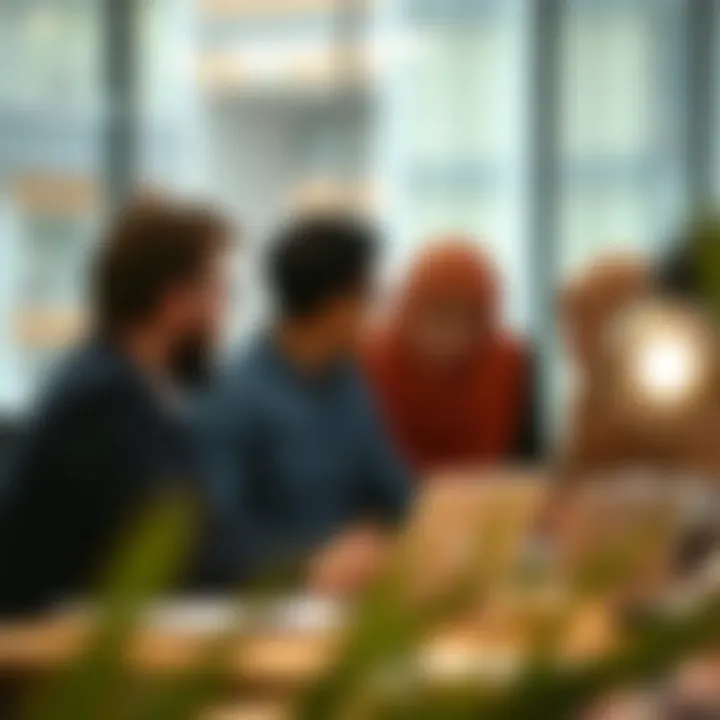 Collaboration in the Workplace Employees engaged in a collaborative discussion