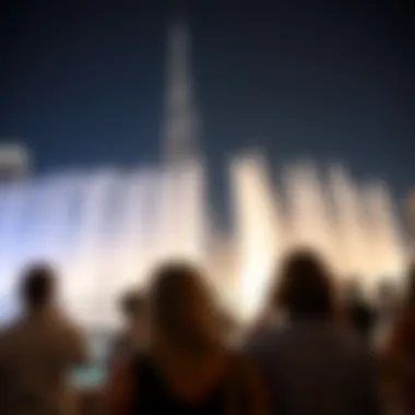 Audience Experience with Burj Khalifa Spectators enjoying the fountain show against the backdrop of the Burj Khalifa
